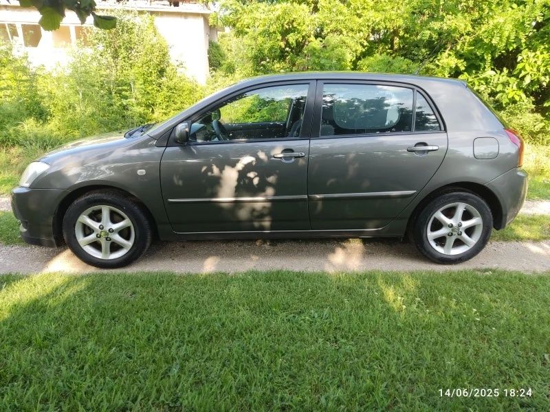 Тойота Corolla 2003