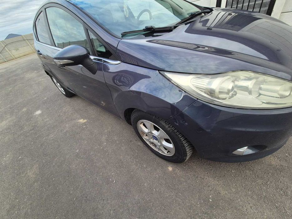 Ford Fiesta, 4 usi, 1,6l, 2011, 96 cp