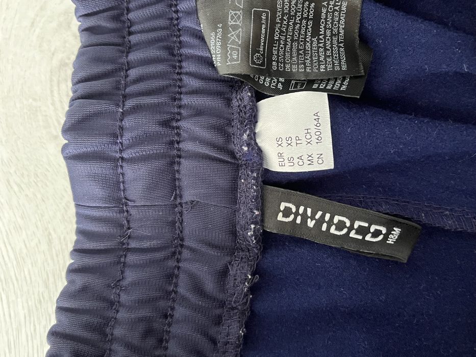 Pantaloni evazati cu fermoar