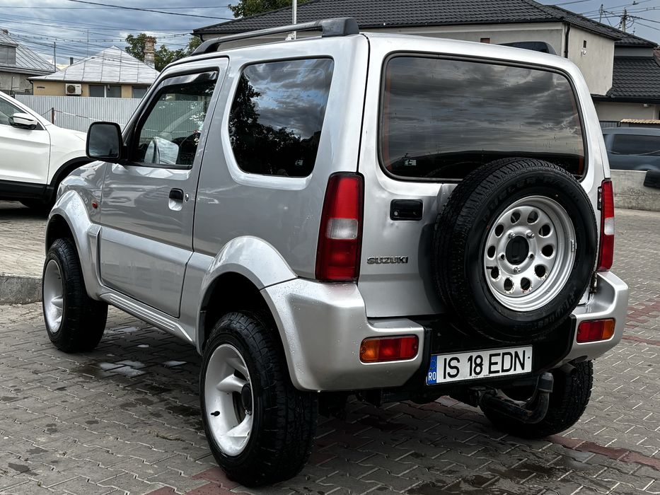 Suzuki jimny 4x4 cu reductor la maneta , 2006 aer conditionat