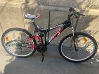 Bicicleta Mountainbike full suspension roti pe 26" aproape noua !!