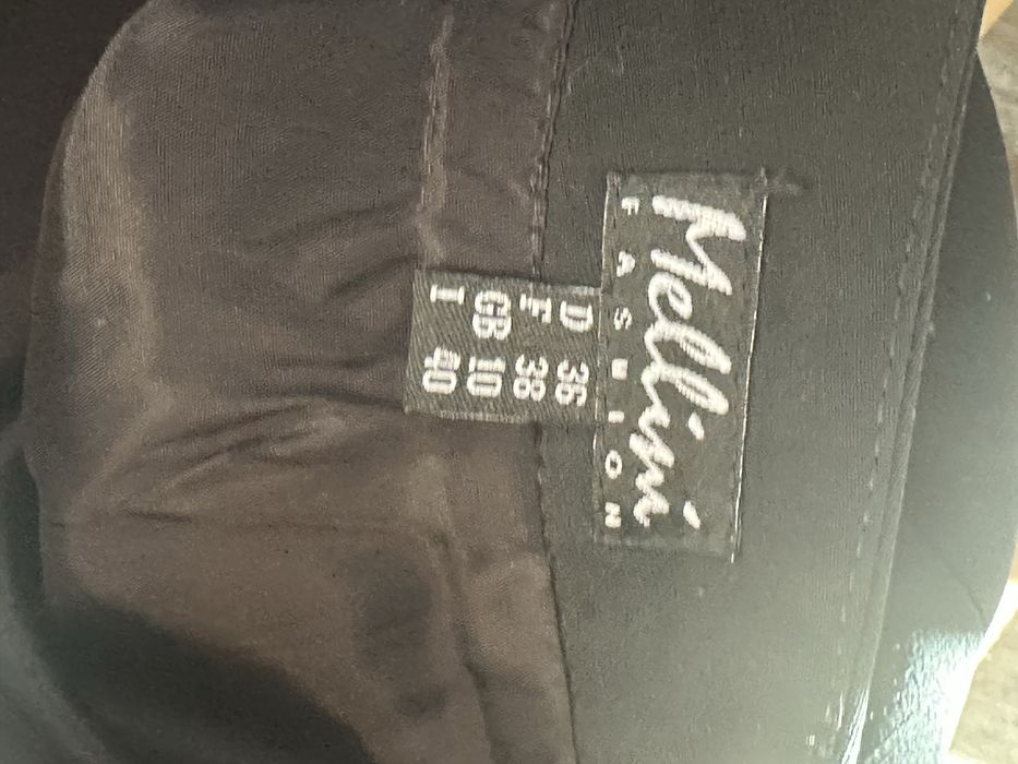 Стилен костюм черно и бяло, сако Тип Chanel на Mellini fashion