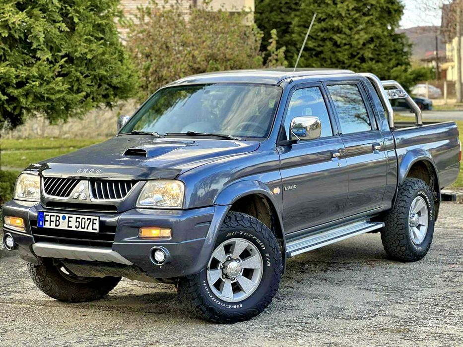 - IMPECABIL Mitsubishi L200 2.5Di-D133cp DAKAR EDITION Full