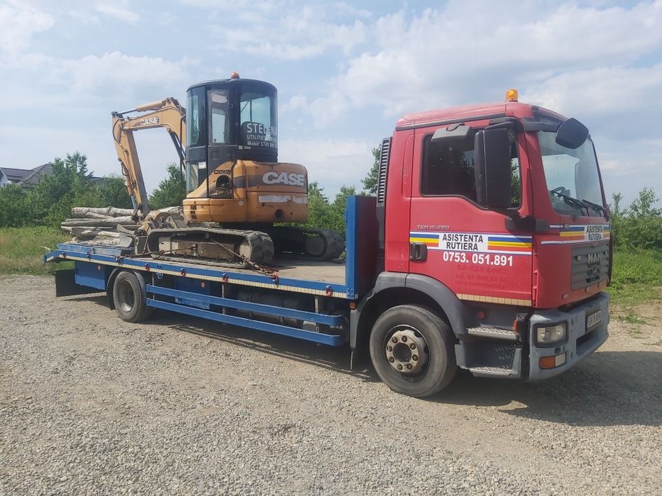 Transport buldo excavatoare,utilaje,tractoare,inchiriez platforma trai