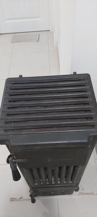 Sobă șamotată cu burlane, coturi și radiator de căldură