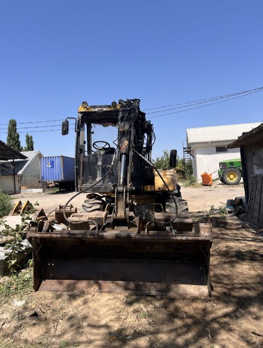 Excavator pe roti de 7.7 tone,Mecalac,posibil variante