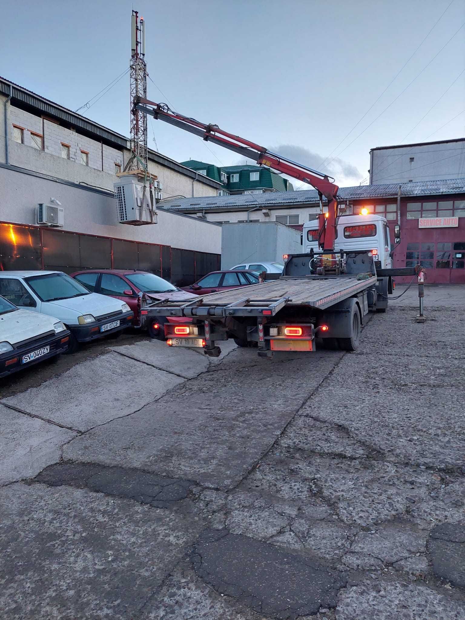 Man 12 T cu Macara . Platou Hidraulic si Furculita