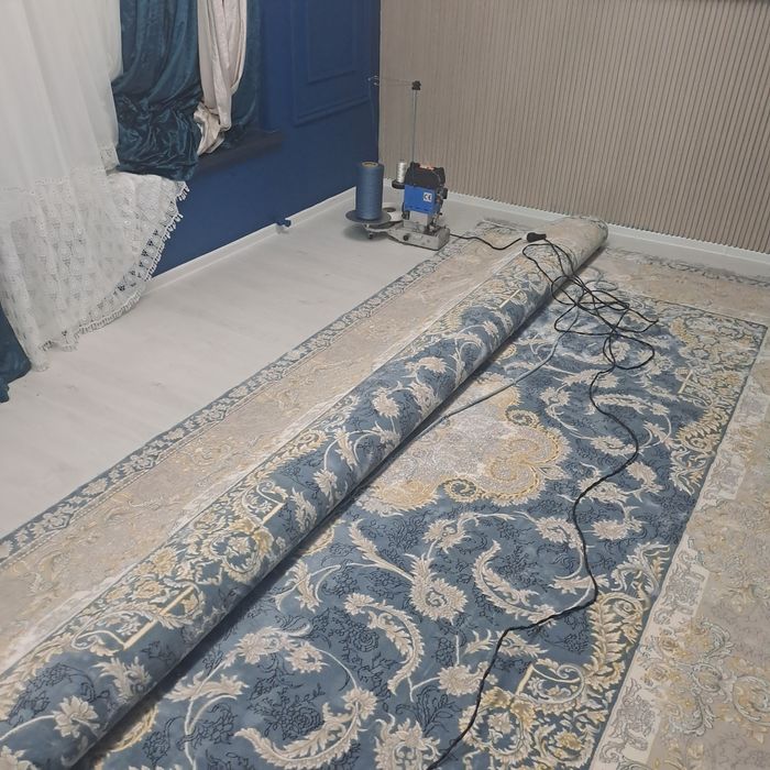 Gilam kesish va tikish