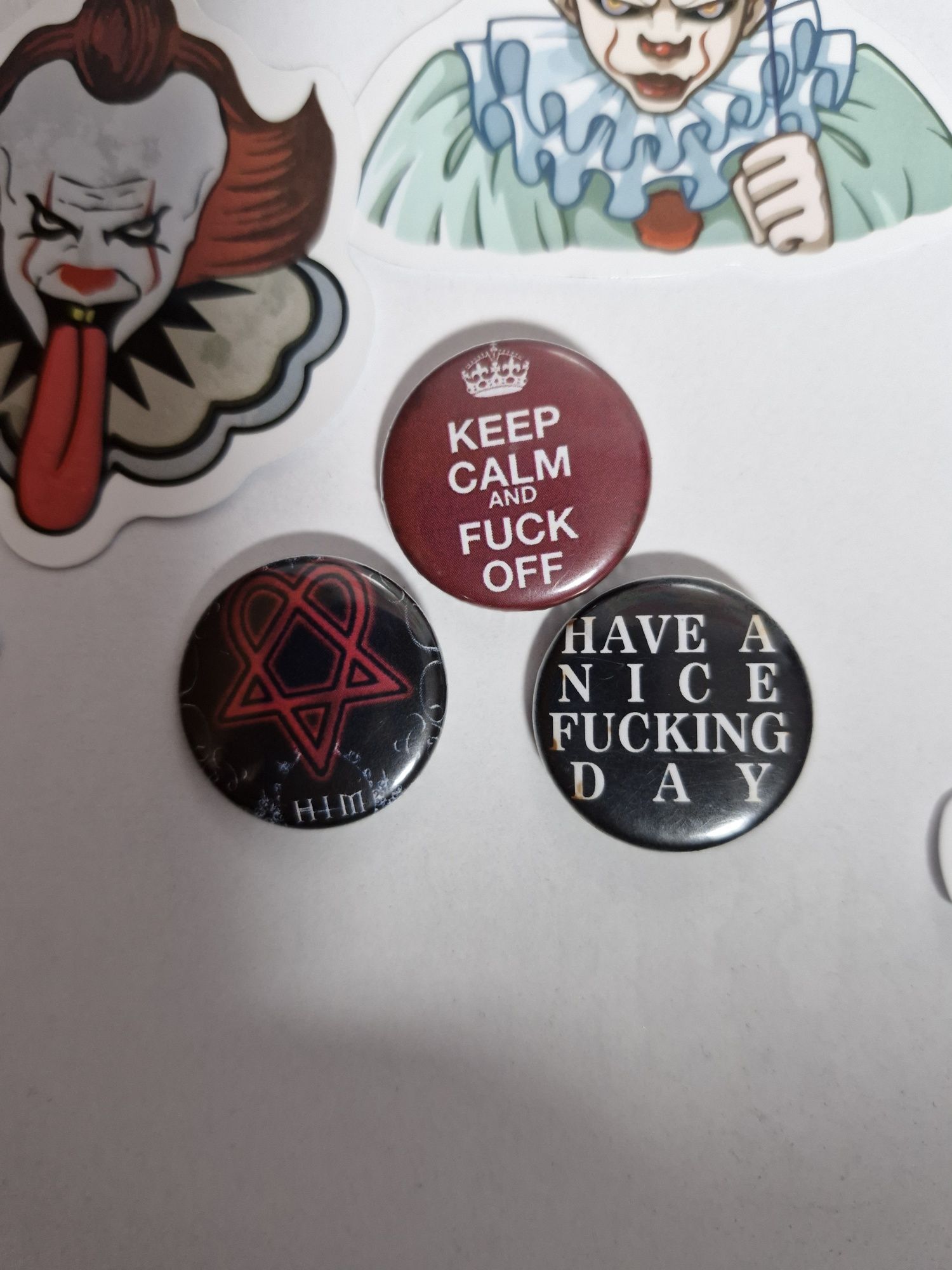 Horror movie stickers and random pins
