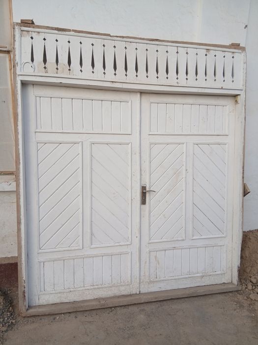 Тахтадан ясалган дарвоза