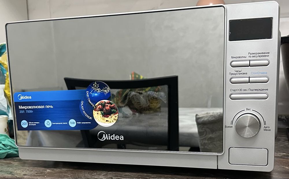 Продам микровалновую печь Midea