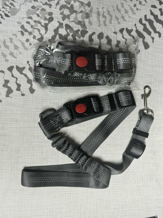 Предпазен колан и повод за домашен любимец , куче  в кола