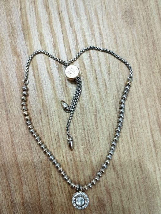 Дамска гривна Ralph Lauren – златиста и сребриста

Описание:
Про