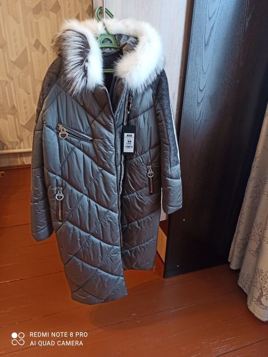 Продам новый пуховик -дубленку.Турция