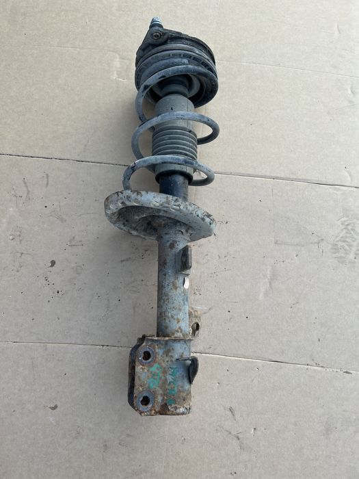 Ansamblu Amortizor stanga fata cu arc si flansa Nissan Micra