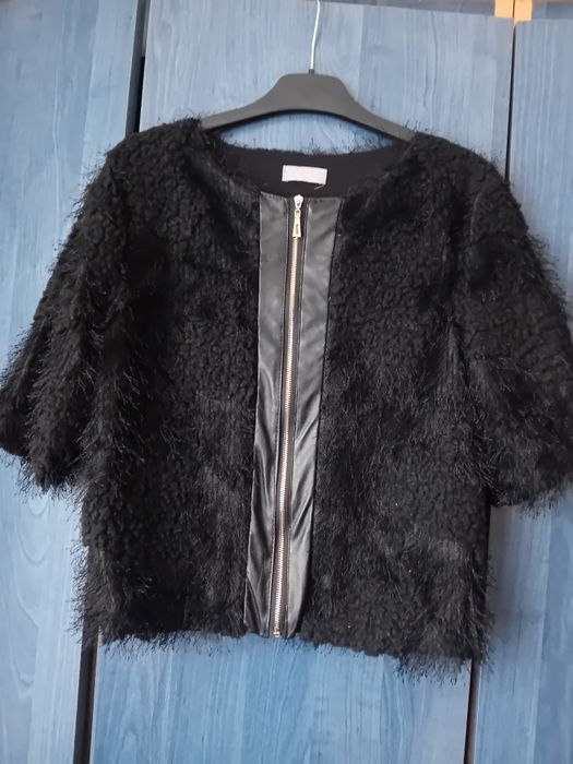 Scurtă elegantă de damă