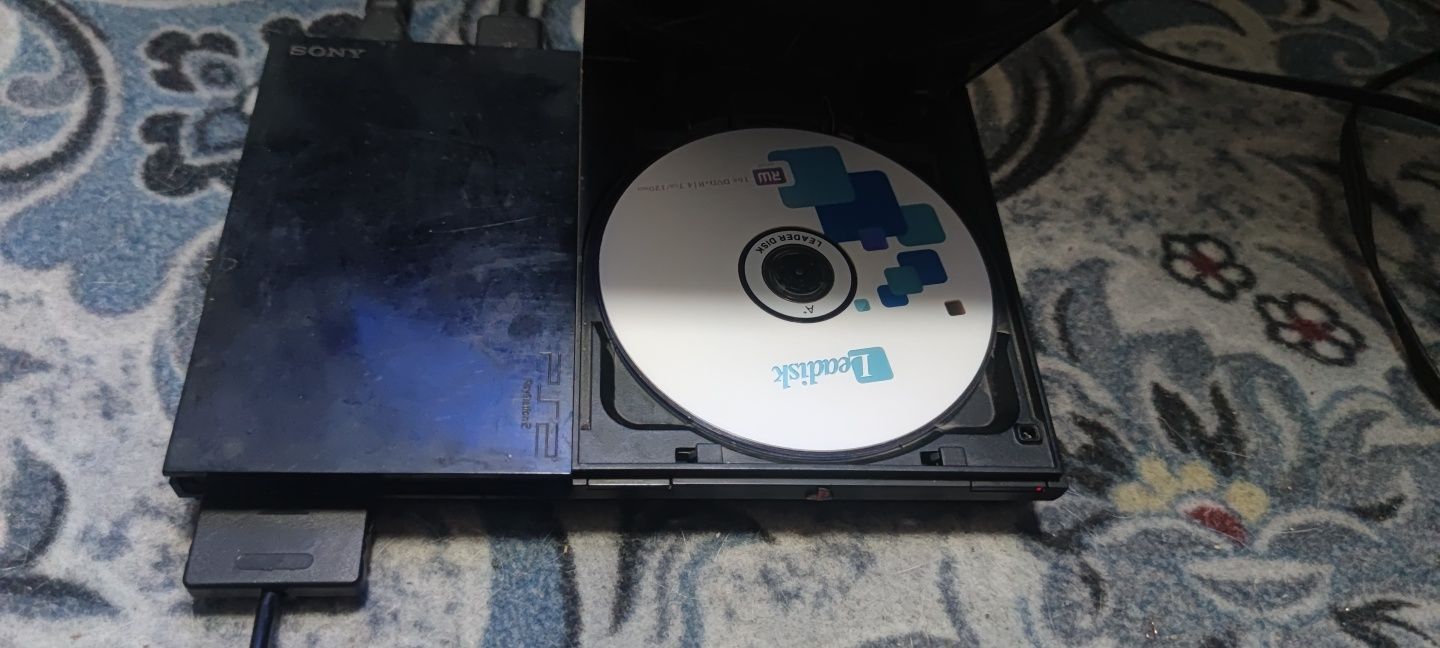 Продам PS2 с играми