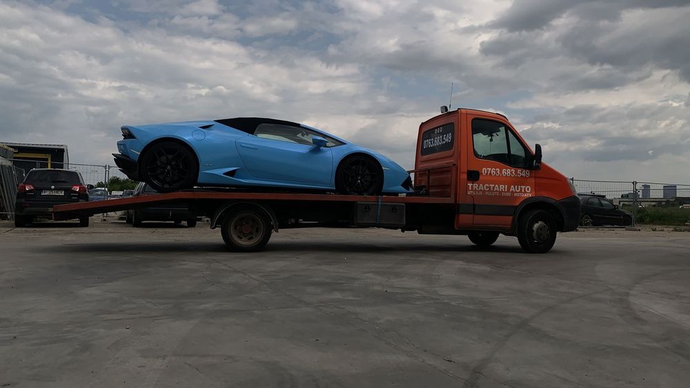 Tractari auto moto dube Transport utilaje Asistenta rutiera Platforma