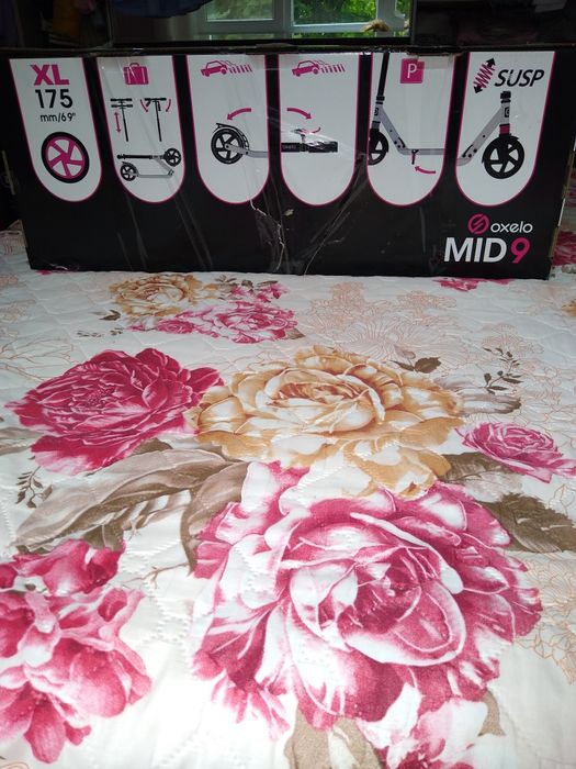 Тротинетка  OXELO MID 9 - XL. Лилав цвят.По-бърза и удобна. ,.