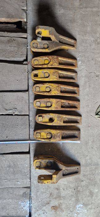 Продам новый комплект зубья, клыки на погрузчик ZL, XCMG. Цена 80000 т