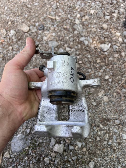 Оригинален Заден ляв апарат за Шкода Октавия 2 4х4