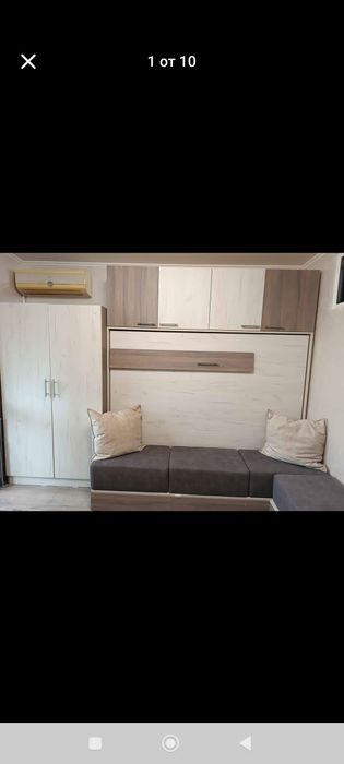 Падащо легло тип ъглов диван с гардероб и надстройка.