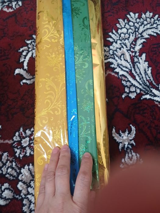Продам бумаги для упаковки подарков и бантики, ленты атласные