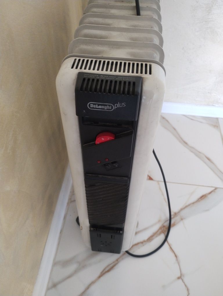 Маслен радиатор delonghi