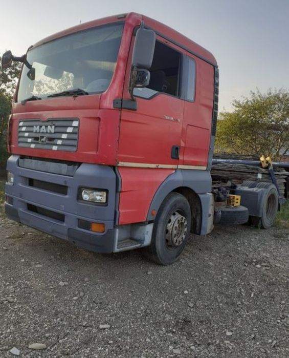 Man cap tractor de vanzare