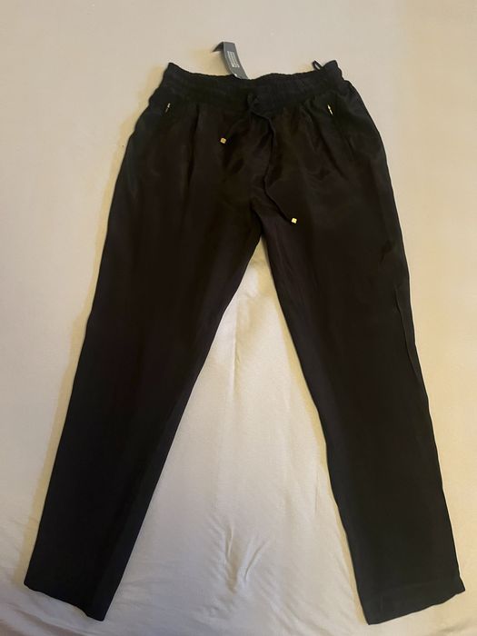 Pantaloni dama negri luciosi