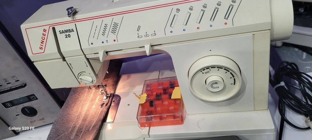 Mașina de cusut Singer