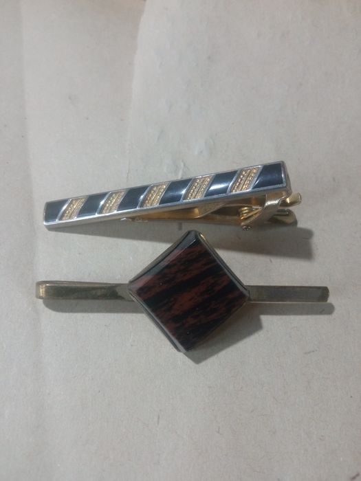 Запонки и зажимы