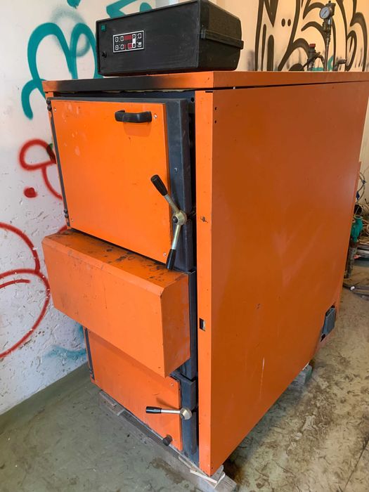 Centrala lemne  arca 69kw,horn,pompe