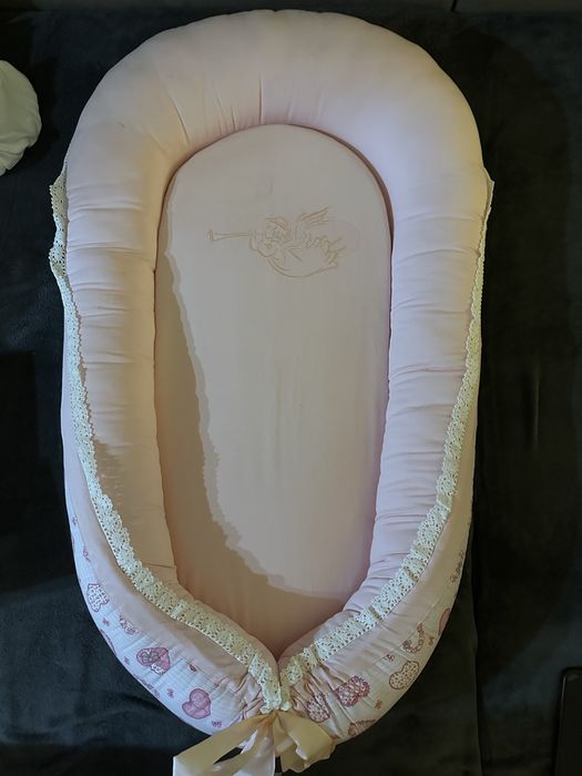 Baby nest roz foarte putin utilizat