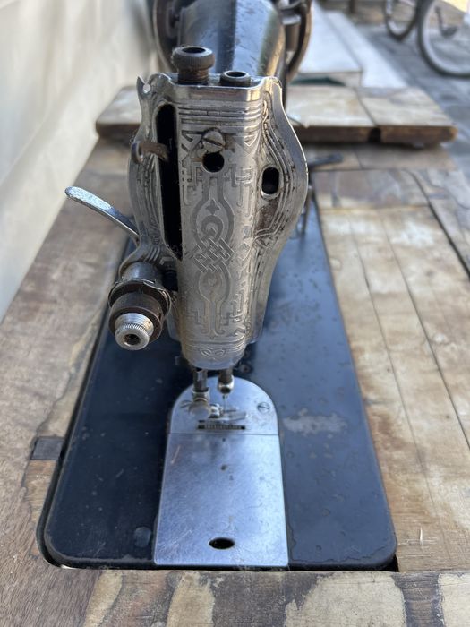 Masina de cusut Singer