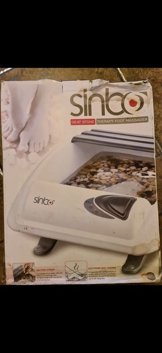 Cada masaj picioare cu roci vulcanice