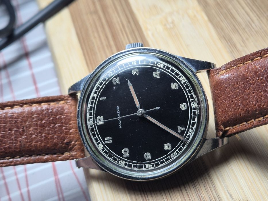 Ultim pret..Movado 1940s, black dial gilt, military