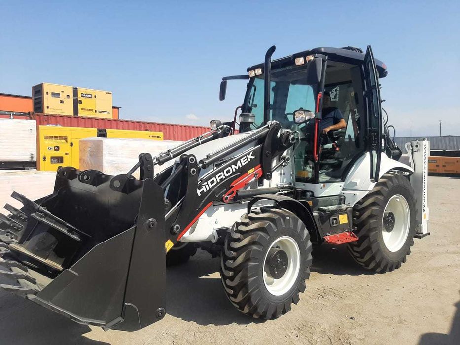 Услуги 3в1, аренда экскаватора-погрузчика 3в1 с гидромолотом