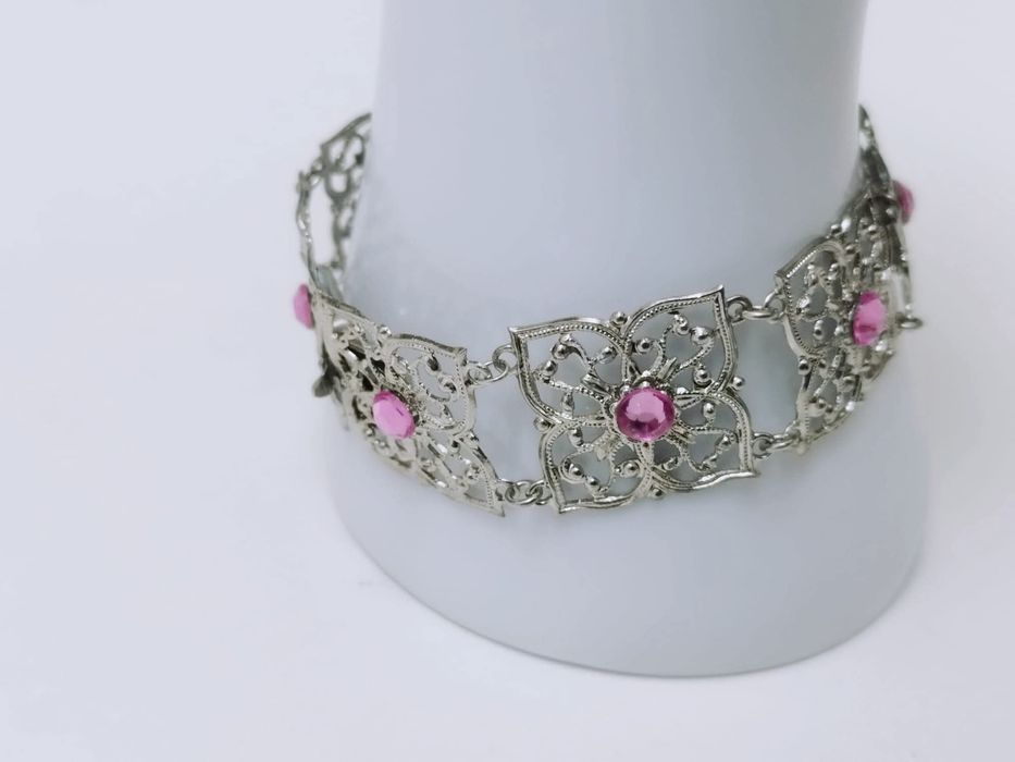 Veche bratara in filigran, placata cu argint, cu pietre roz