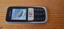 Telefon ieftin cu butoane clasic Nokia 2630,codat Orange.Mic si slim