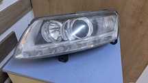 far stanga Audi A6 C6 Facelift an 2011 cod 4F0941003CP