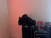 Jordan 4 black cat