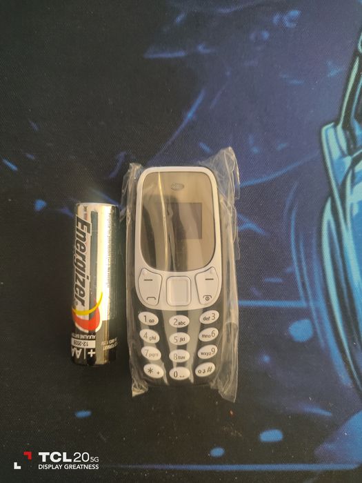 Мини GSM с две сим карти и Bluetooth