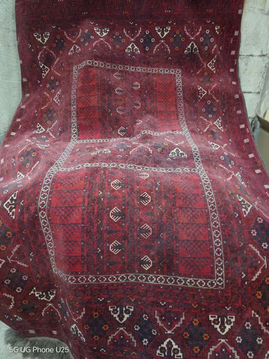 Ръчно тъкан килим