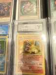 Carti pokemon gradate Charizard Venusaur Blastoise base set