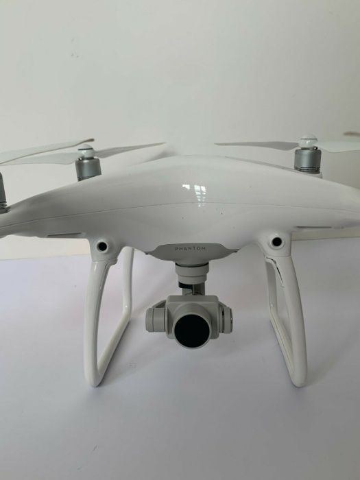 Drona DJI Phantom 4, acumulatori 3 buc. , Geanta DJI Rucsac special +