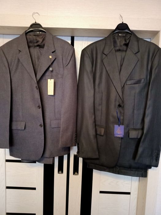 Продам муж. костюмы новые