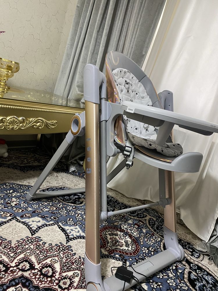 Chaqaloqlar uchun stul va arğimchoq elektron stul