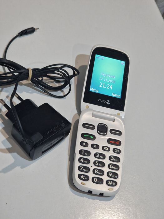 Telefon cu clapeta cu încărcător