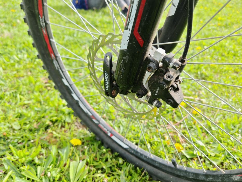 Bicicletă MTB 24", cadru aluminiu, frâne hidraulice pe disc